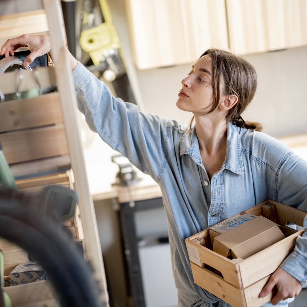 A woman organizing tools