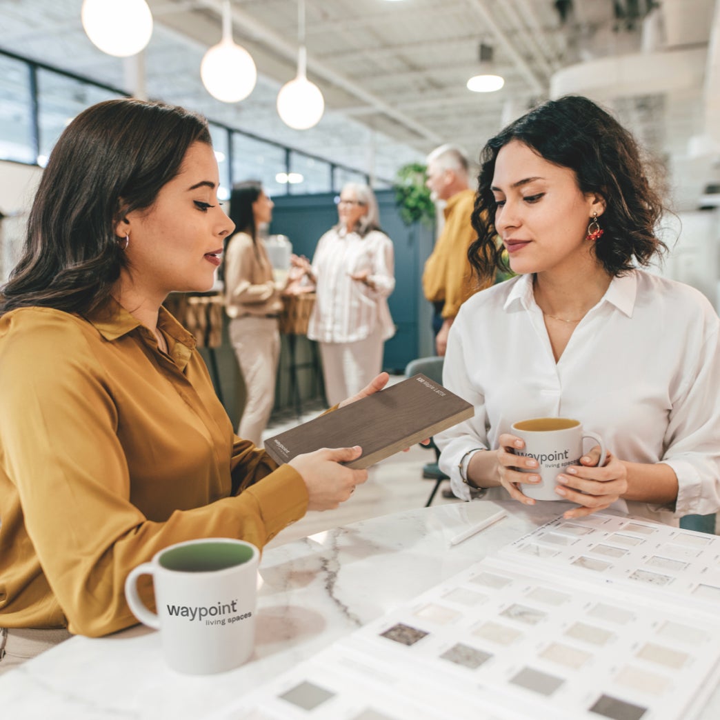 Two women talking in an office